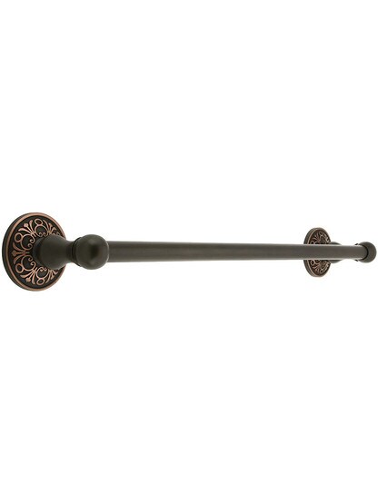 18 inch Brass Towel Bar with Lancaster Rosettes in Oil Rubbed Bronze.